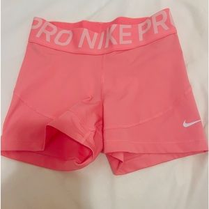PINK AND WHITE NIKE PROS